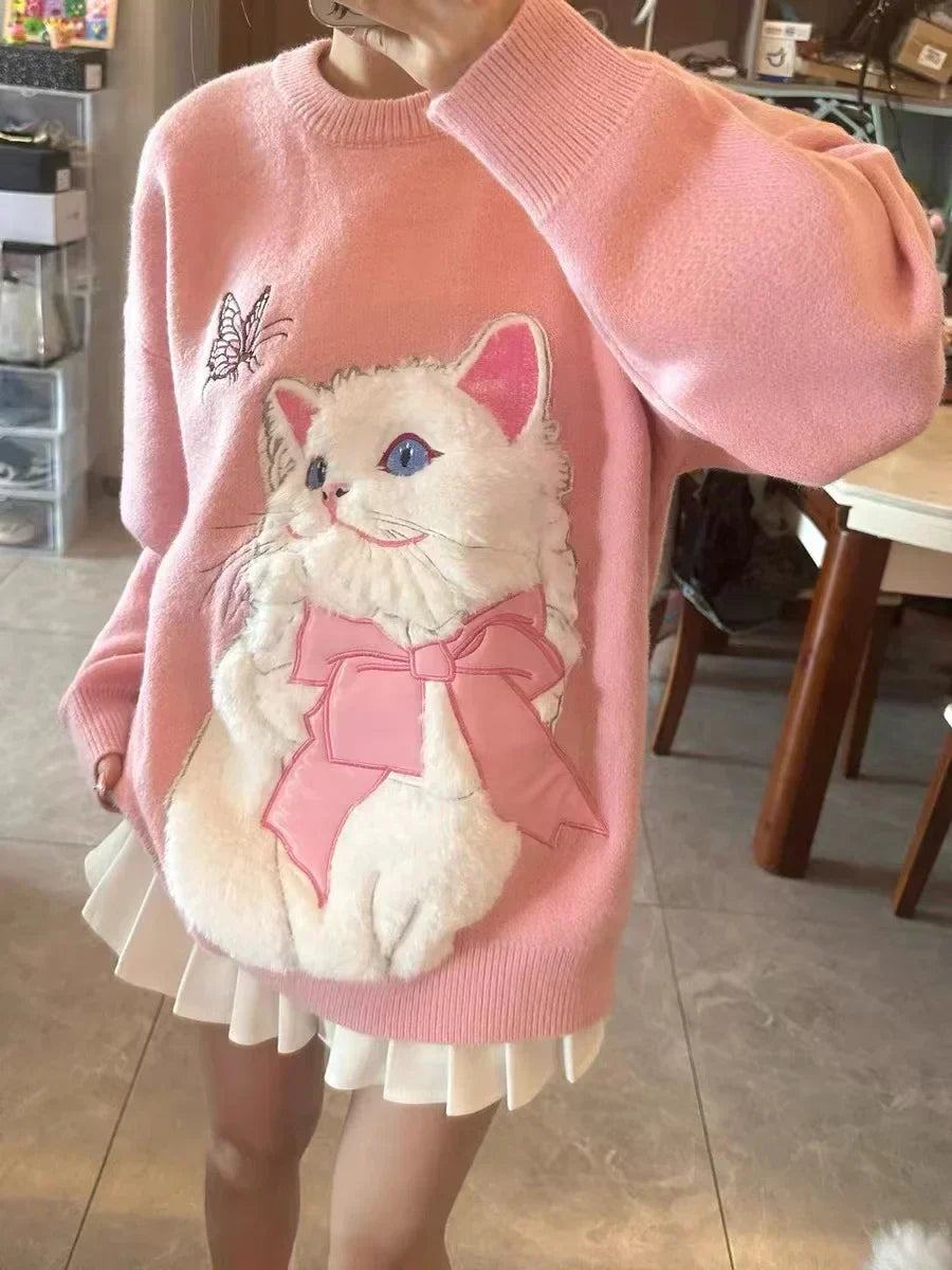 Yasmine - Oversized trui met rozenborduursel en cartoonmotief