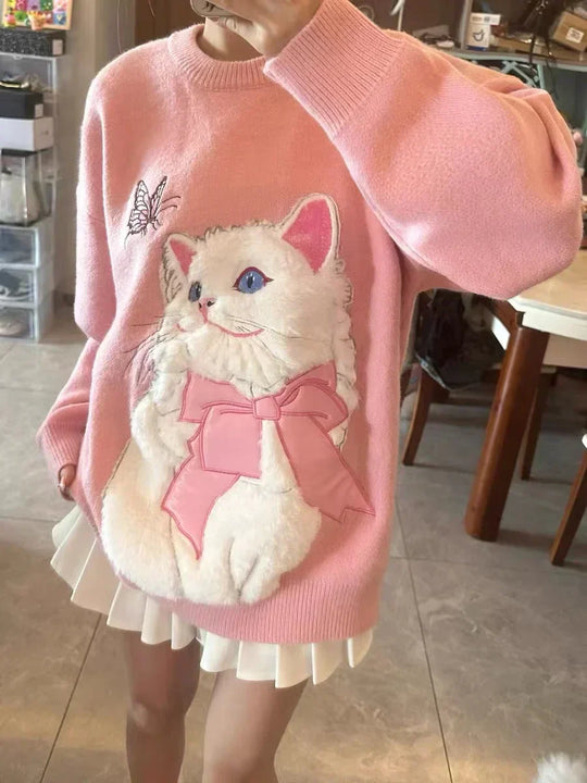 Yasmine - Oversized trui met rozenborduursel en cartoonmotief