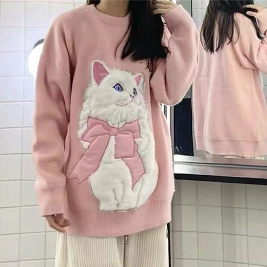 Yasmine - Oversized trui met rozenborduursel en cartoonmotief