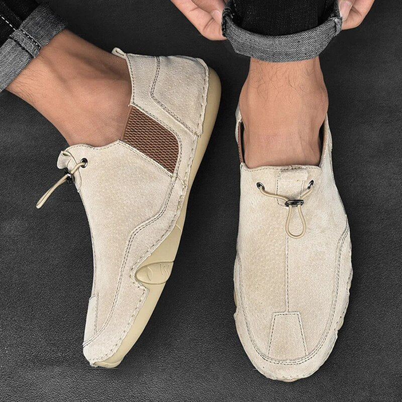 https://cdn.shopify.com/s/files/1/0836/8488/4814/files/SXwd2022-Heren-Sneakers-Casual-Slip-Op-Loafers-Outdoor-Licht-Flats-Herfst-Echt-Lederen-Schoenen-Comfortabele-Effen_b8729e84-3445-4288-8a79-7a074d660a74.jpg?v=1744444068