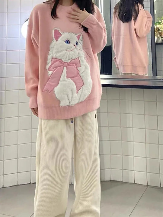 Yasmine - Oversized trui met rozenborduursel en cartoonmotief