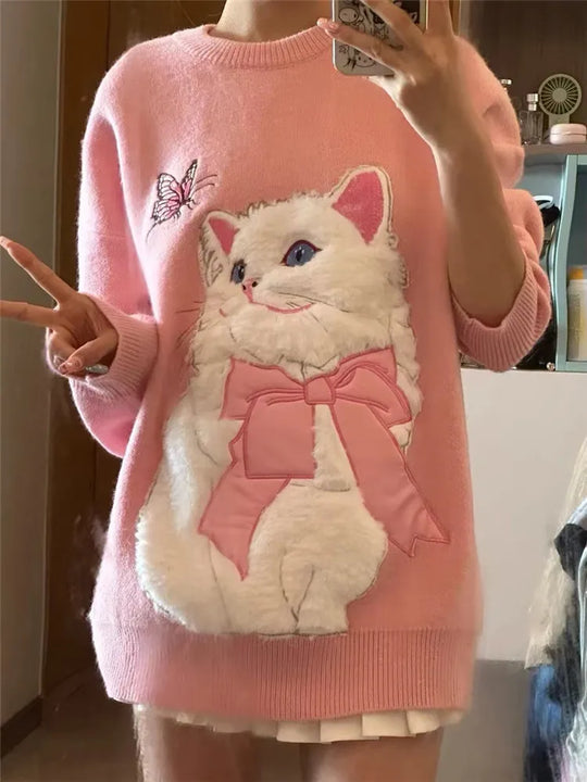 Yasmine - Oversized trui met rozenborduursel en cartoonmotief