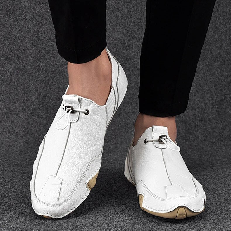 https://cdn.shopify.com/s/files/1/0836/8488/4814/files/VF3H2022-Heren-Sneakers-Casual-Slip-Op-Loafers-Outdoor-Licht-Flats-Herfst-Echt-Lederen-Schoenen-Comfortabele-Effen_9055f99d-f276-49c3-bc2e-c2ba77214394.jpg?v=1744444068